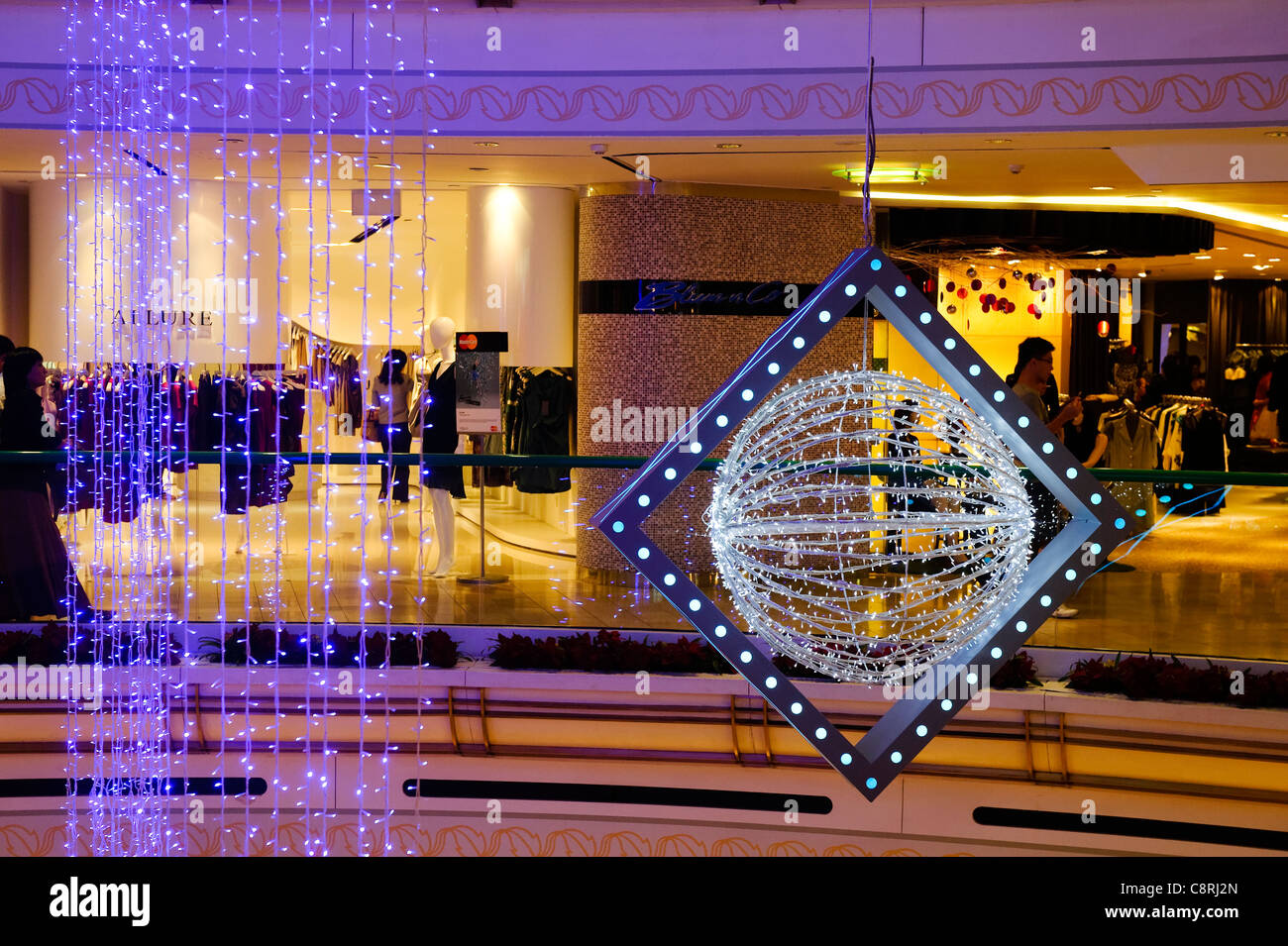 Christmas decorations in the Raffles City shopping mall, City Hall, Singapore Stock Photo