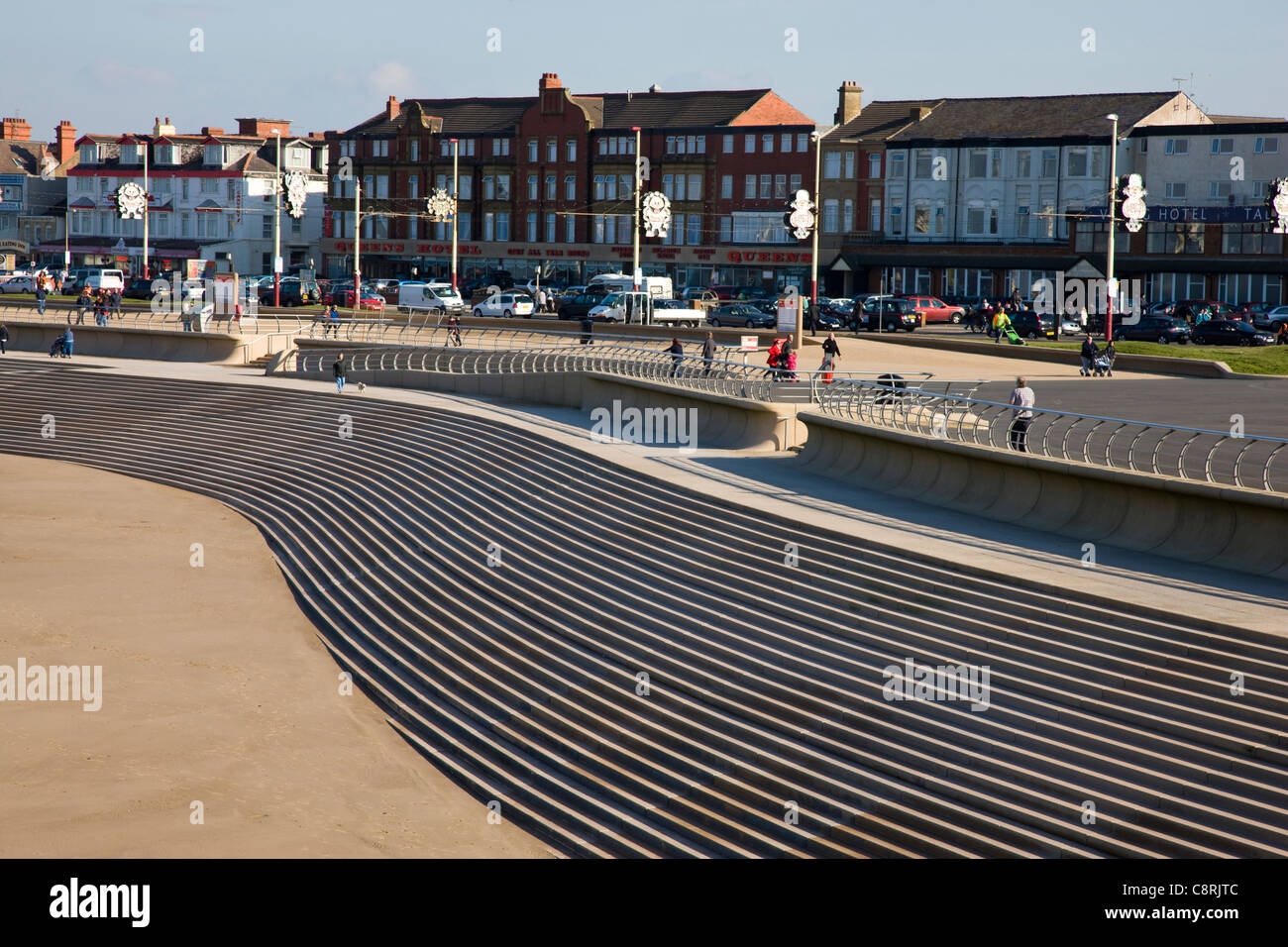 Beautifully curving and curved concrete steps forming part of the sea