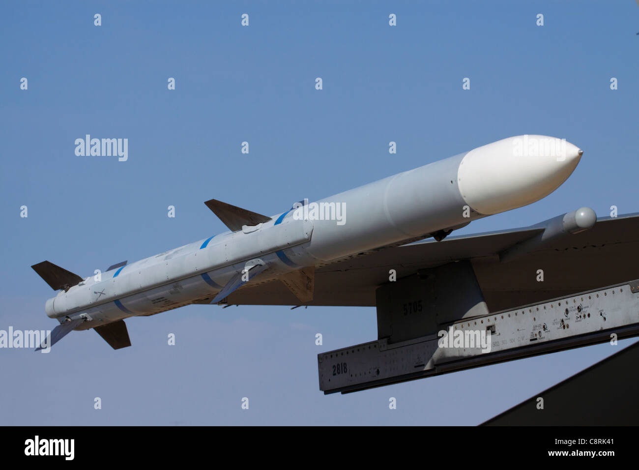 AIM120 AMRAAM airtoair missile on the wing of an F16 fighter jet