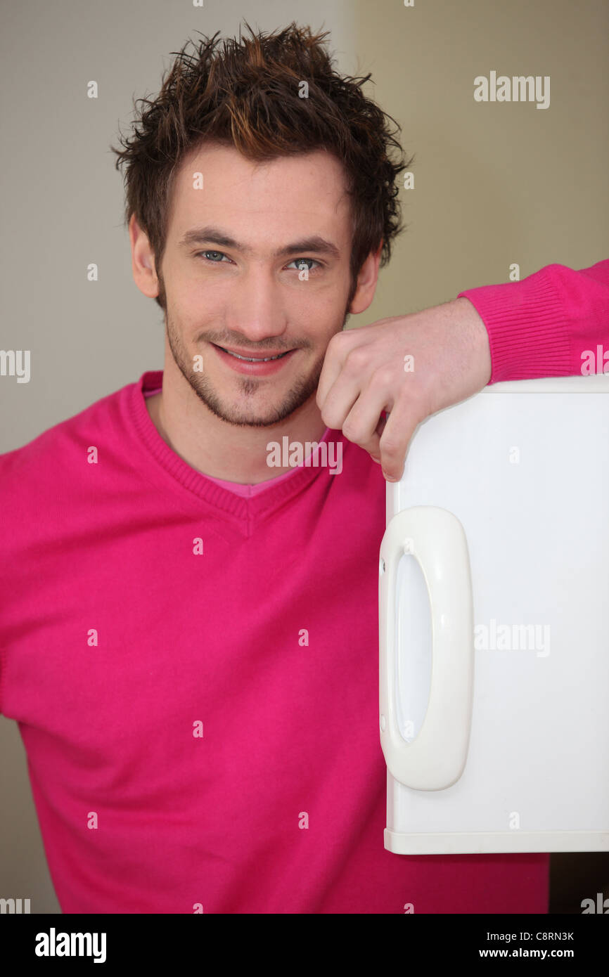 Man looking into a freezer Stock Photo Alamy
