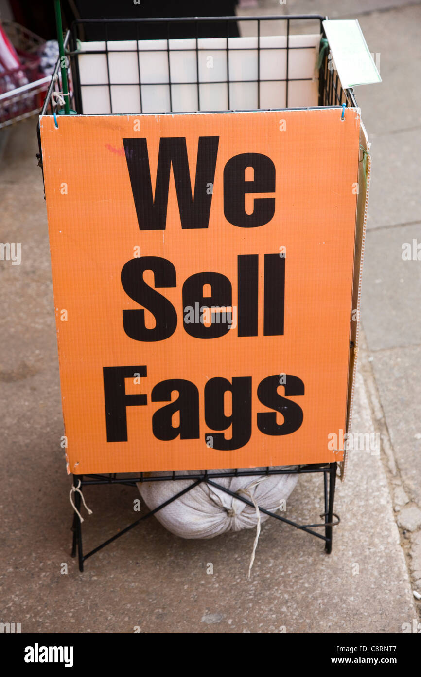 A sign advertising 'We Sell Fags' outside a shop in Blackpool, UK Stock Photo