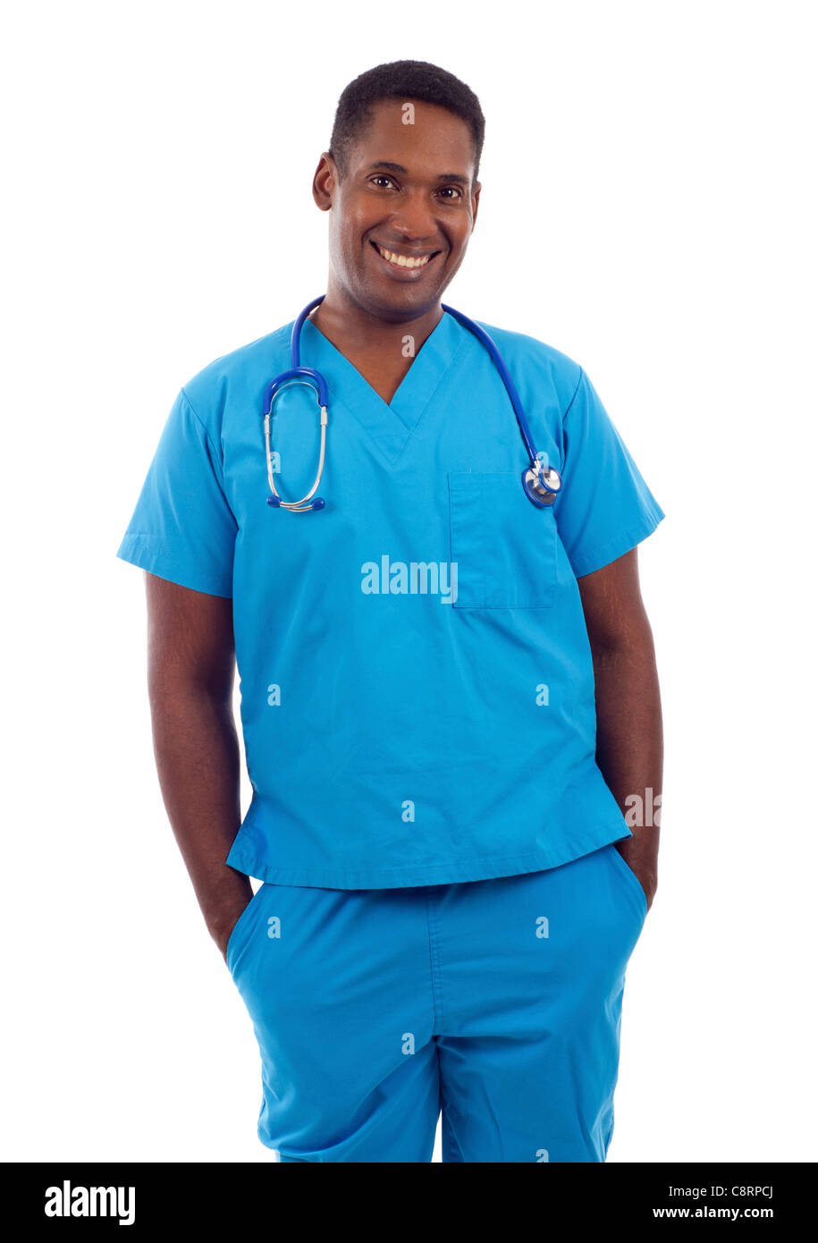 Young African American doctor in scrubs with hands in pockets isolated