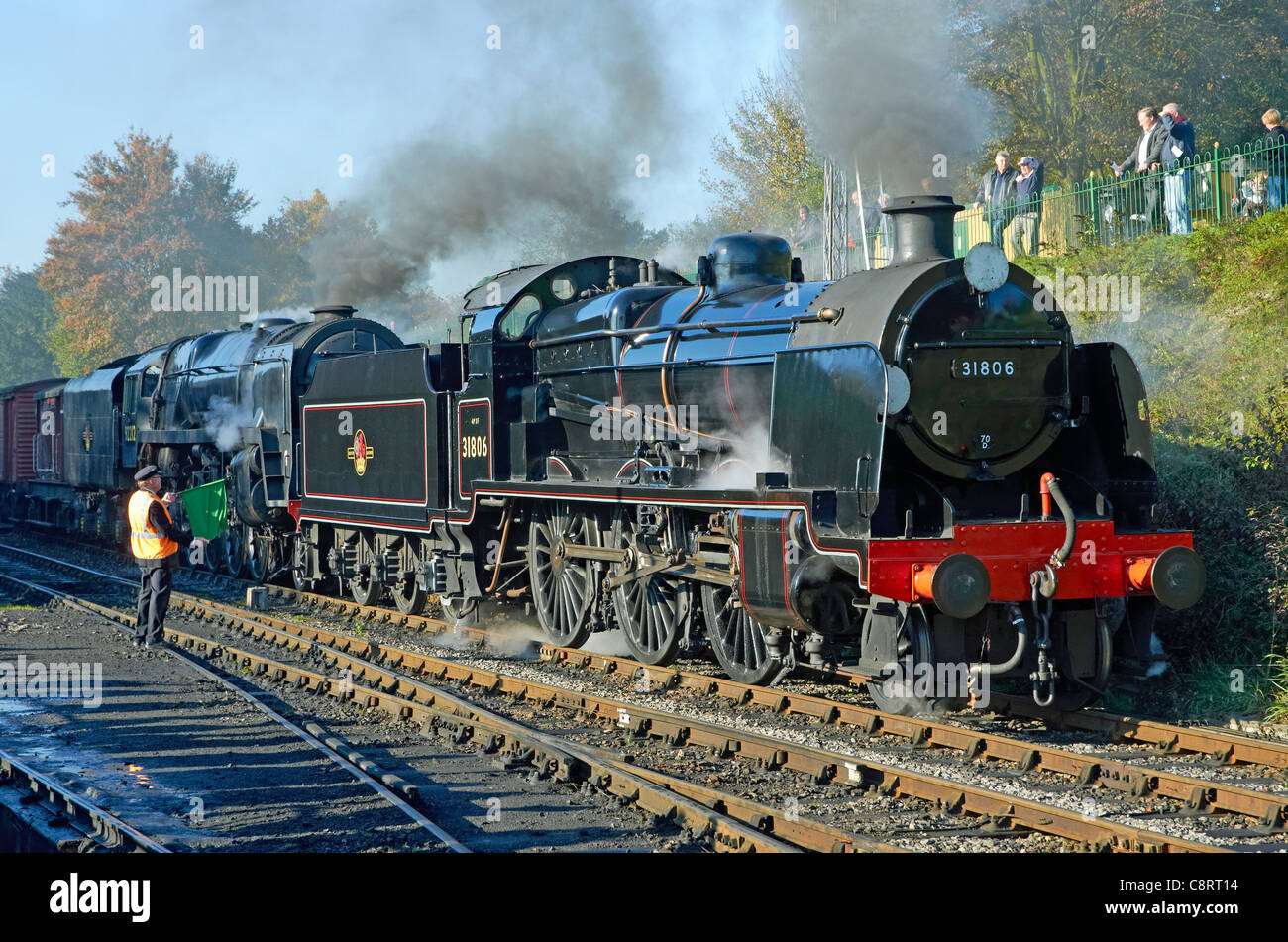 Mid-Hants Railway Autumn Gala 28/10/11. 9F (rear) and U class (front) engines on a demonstration freight train at Ropley. Stock Photo