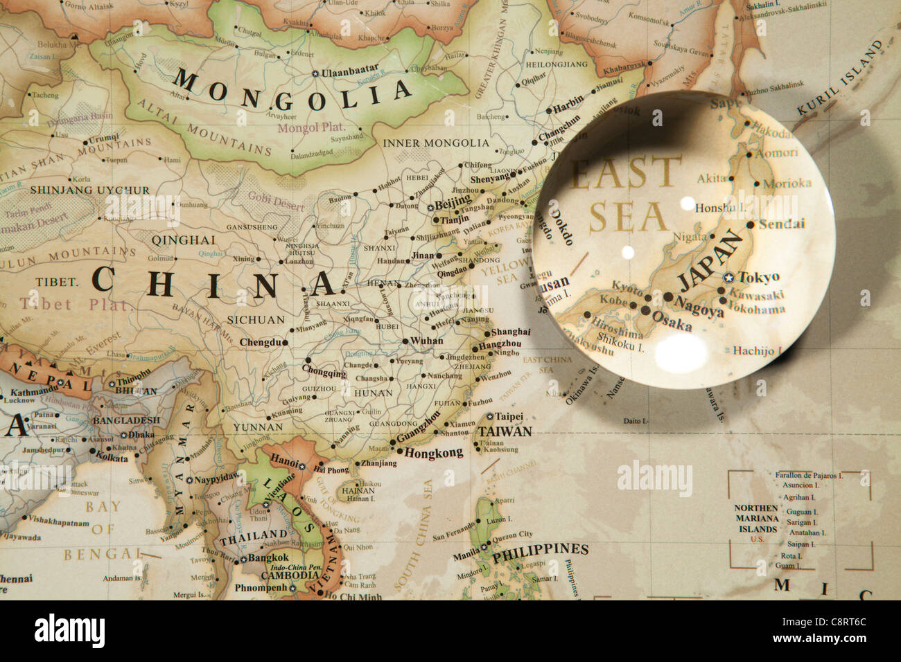 Close-up of Asian continent world map with crystal ball Stock Photo