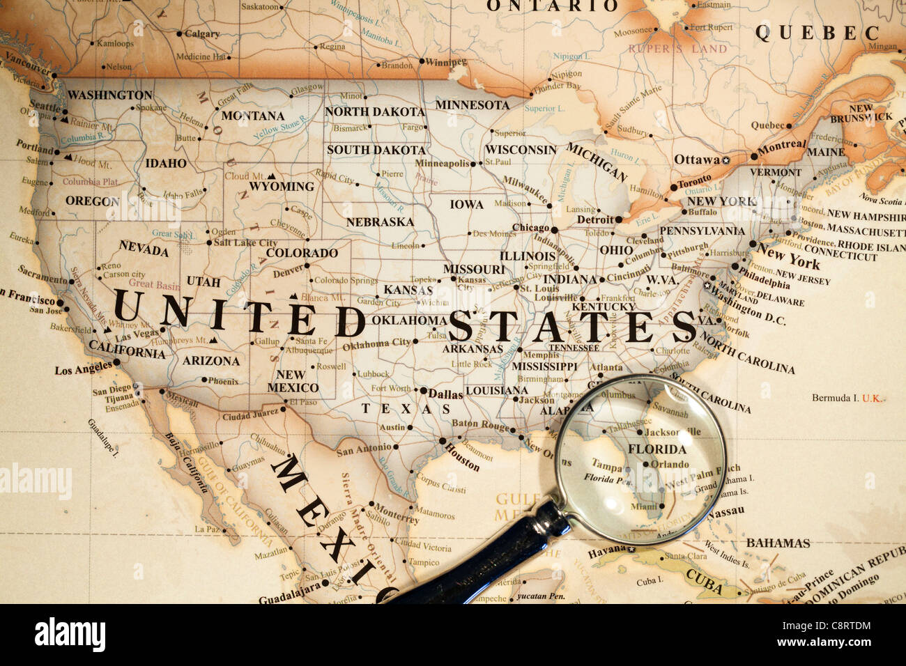 Close-up of North American continent world map with magnifying glass Stock Photo
