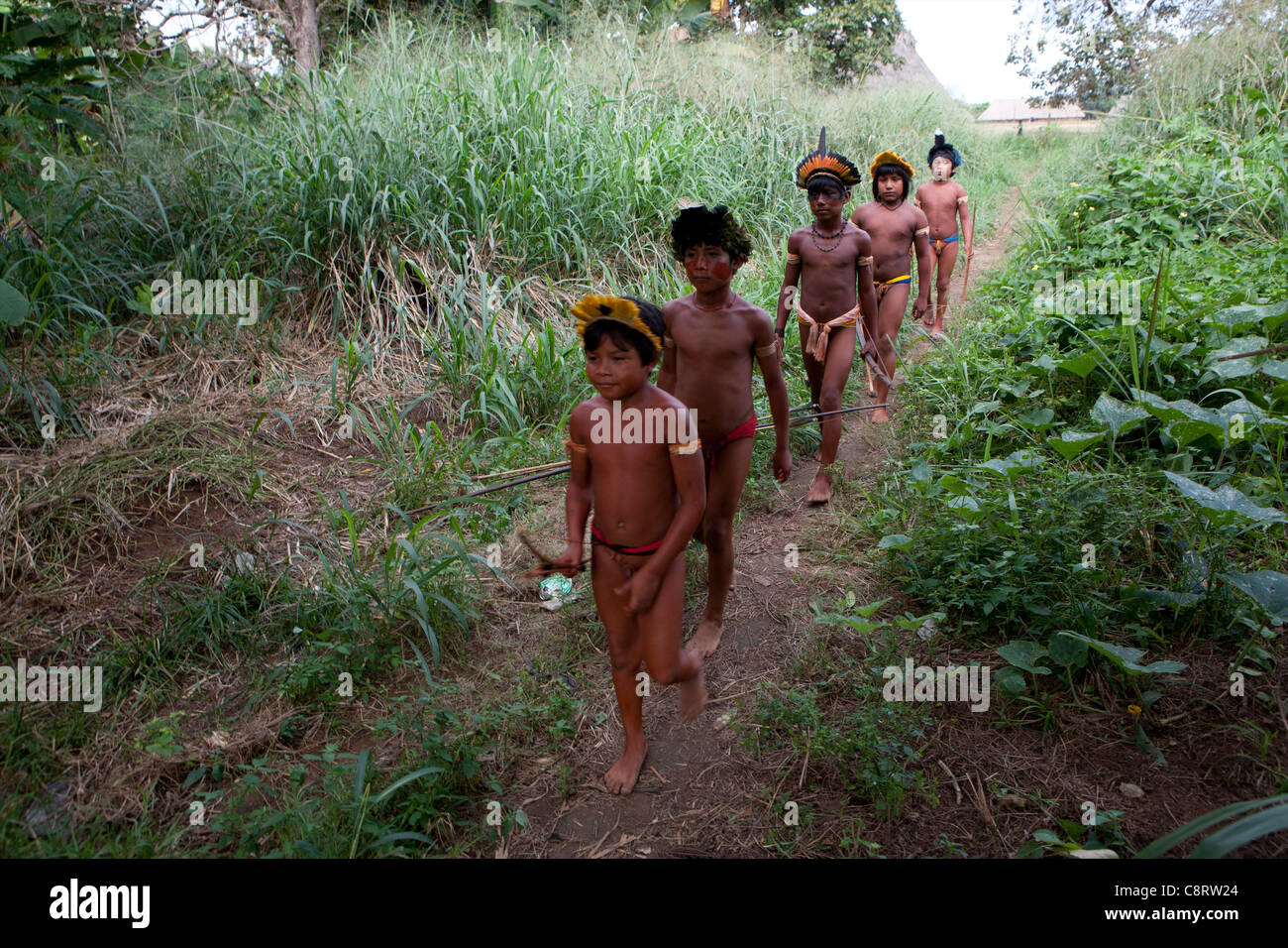 Nude xingu Xingu indians hunting in the Amazone, Brazil Stock Photo - Alamy