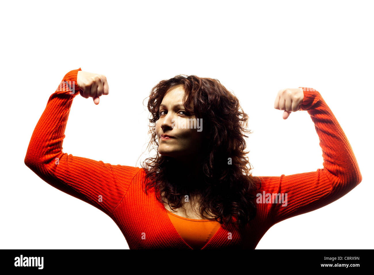 Woman Flexing Her Muscles Stock Photo