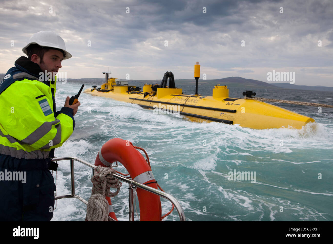 The Scotrenewables Tidal Turbine is an innovative floating tidal stream turbine at present being tested in Orkney Scotland Stock Photo