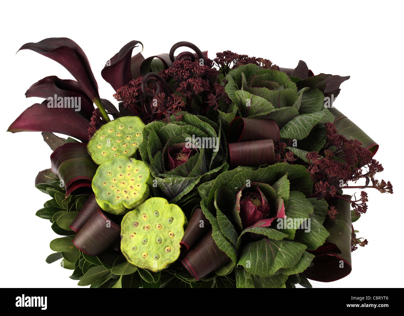 A closeup of a colorful bouquet of flowers. Ornamental cabbage, water