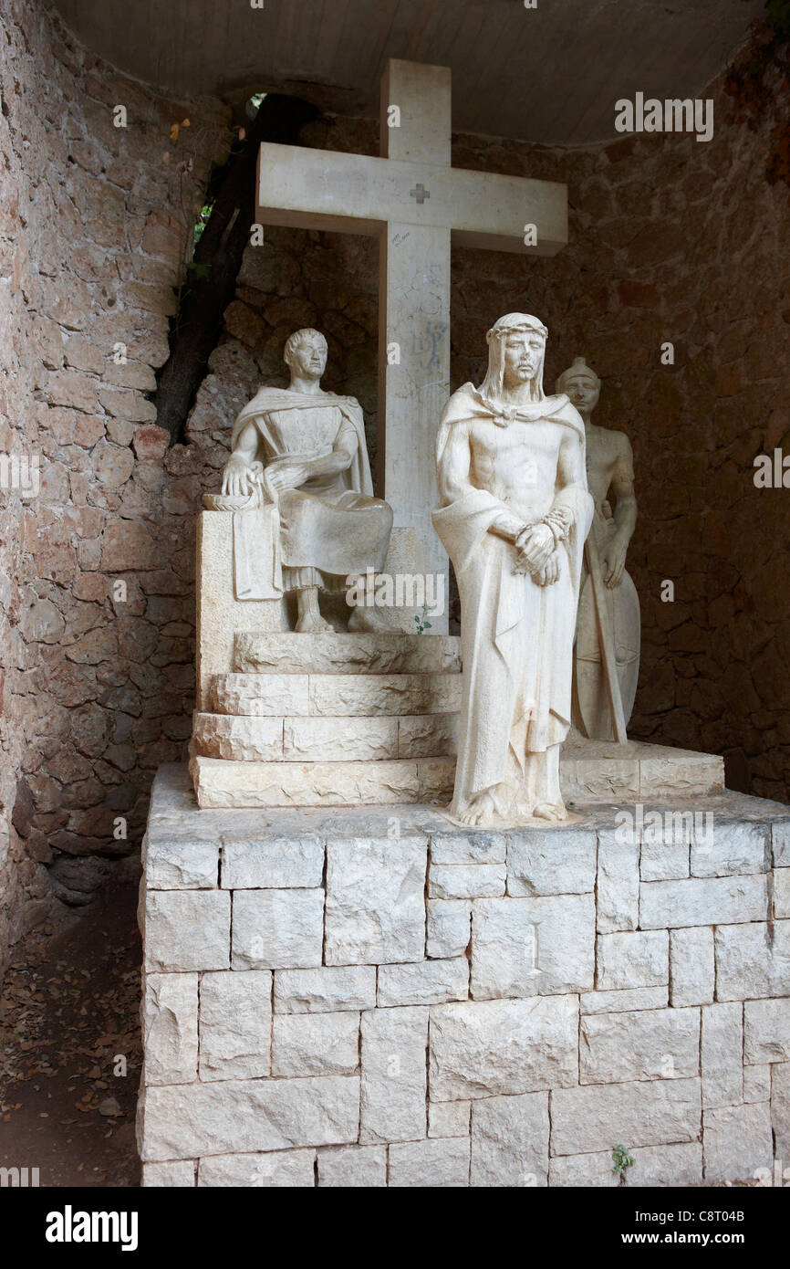 Jesus Christ at trial before Pontius Pilate - sculptural group at Benedictine abbey of Santa Maria de Montserrat. Catalonia, Spain. Stock Photo