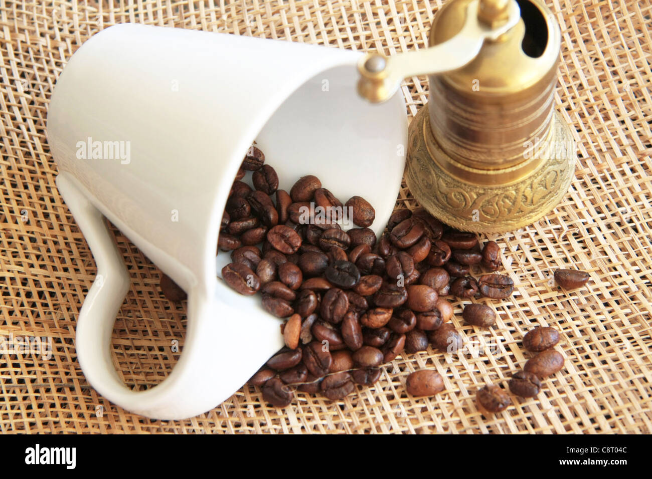 white cup and coffee bean grinder Stock Photo