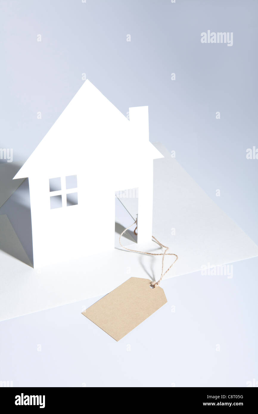 House Model With Tag And White Background Stock Photo