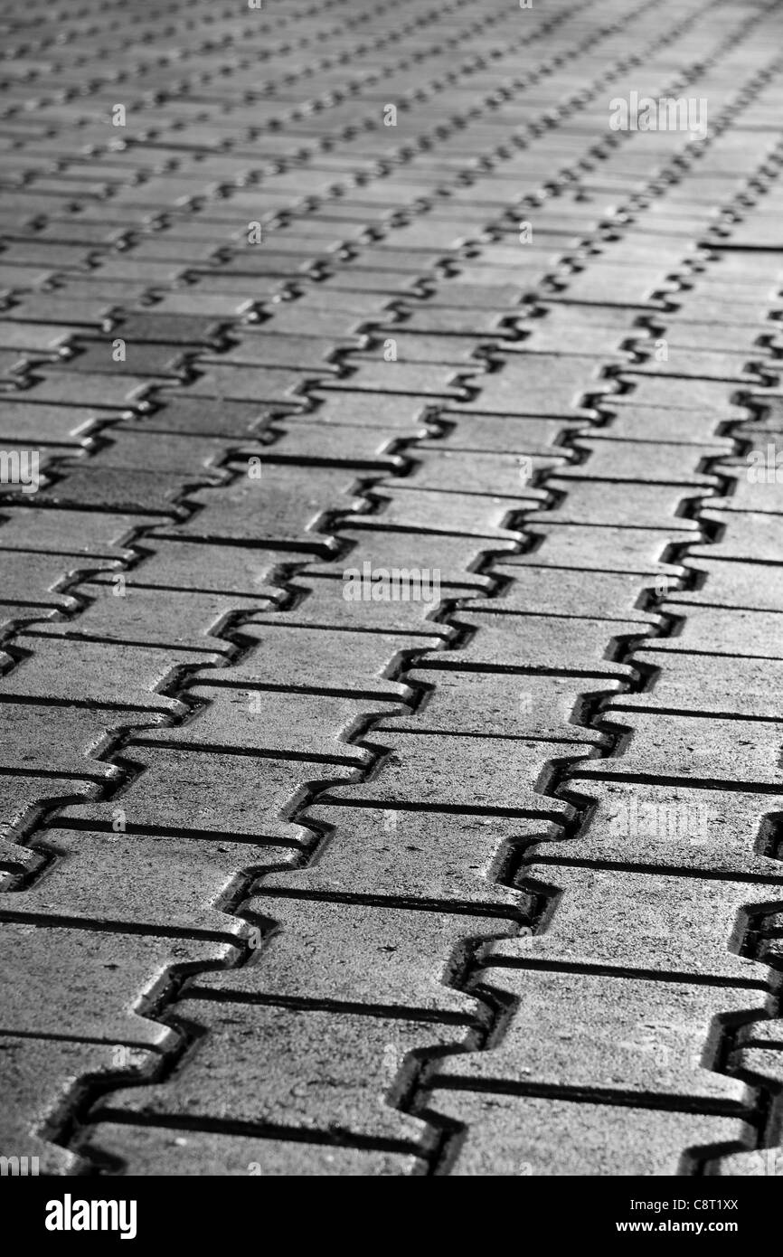 Black & White photo of a pavement pattern. Selective focus. Stock Photo