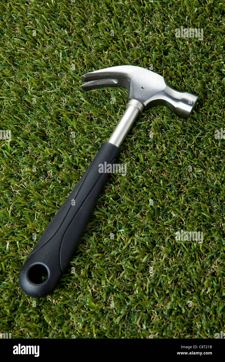 High angle view of claw hammer on grass Stock Photo