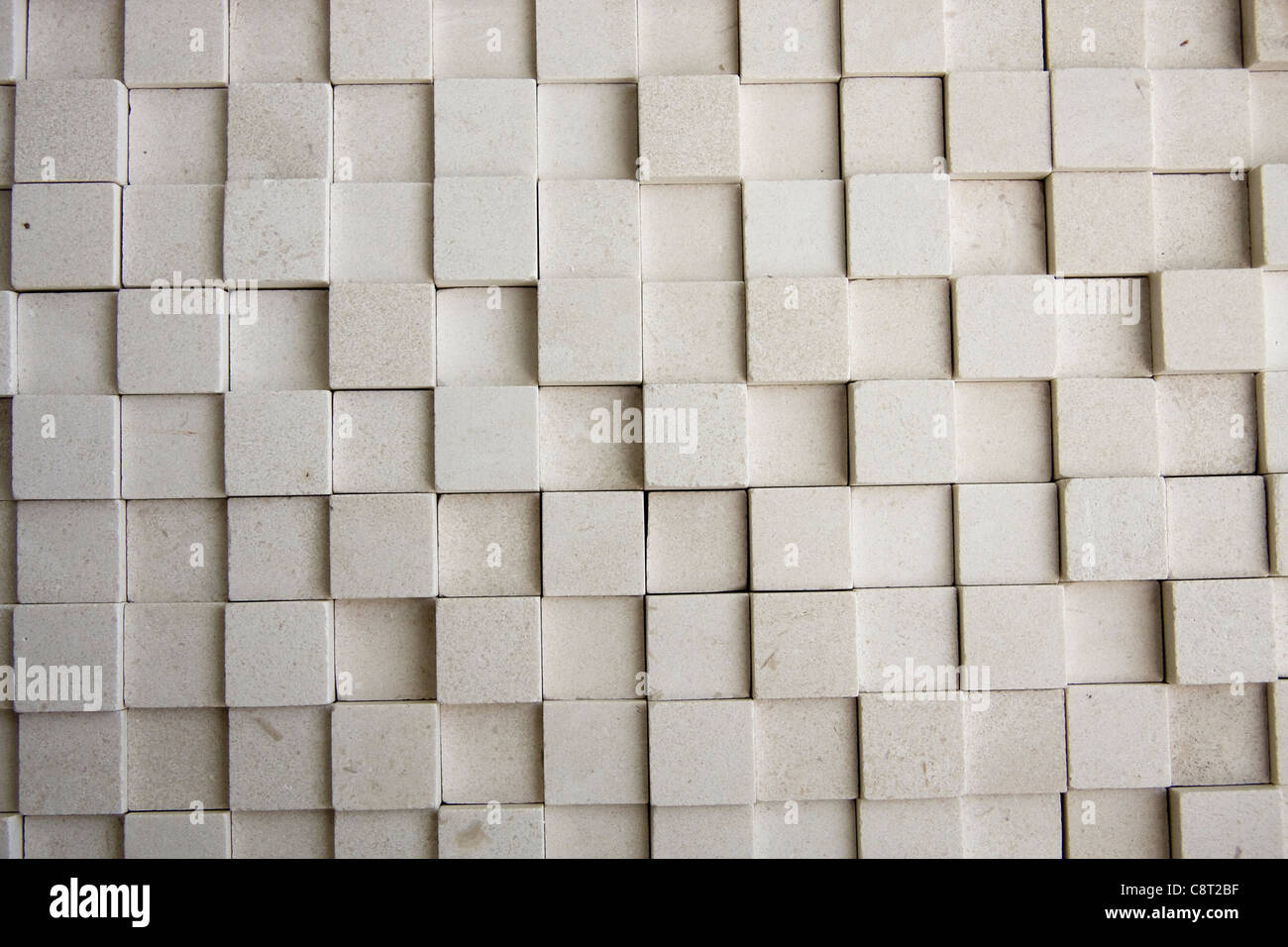 Square shaped stone tiles background. Stock Photo
