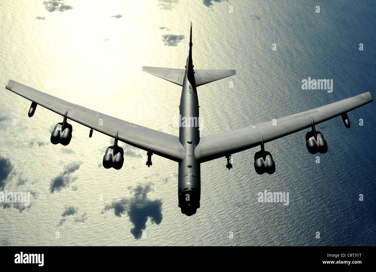 A B-52 Stratofortress from Minot Air Force Base, N.D., flies over the Pacific Ocean Stock Photo