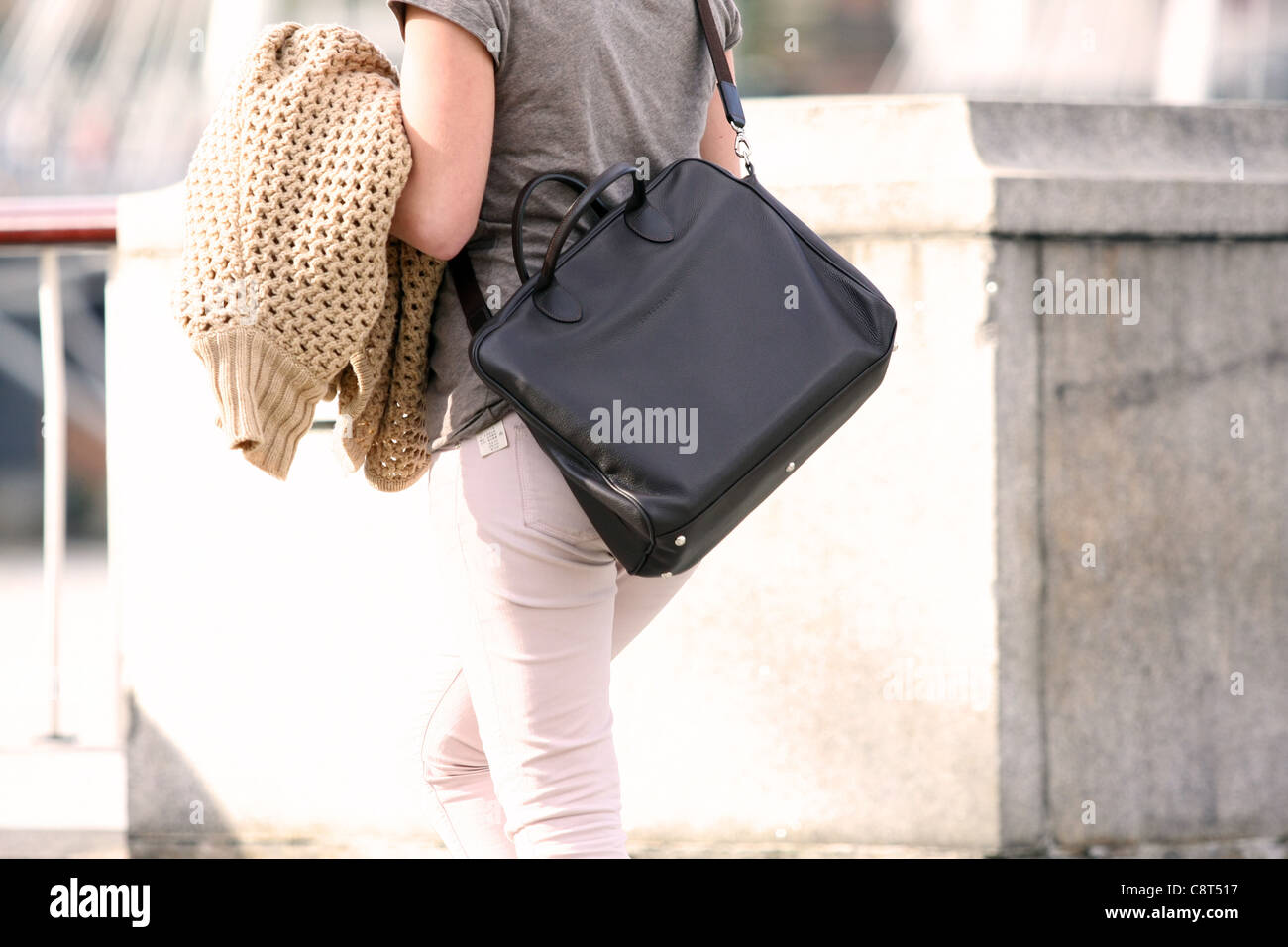Lady carrying a shoulder bag hires stock photography and images Alamy