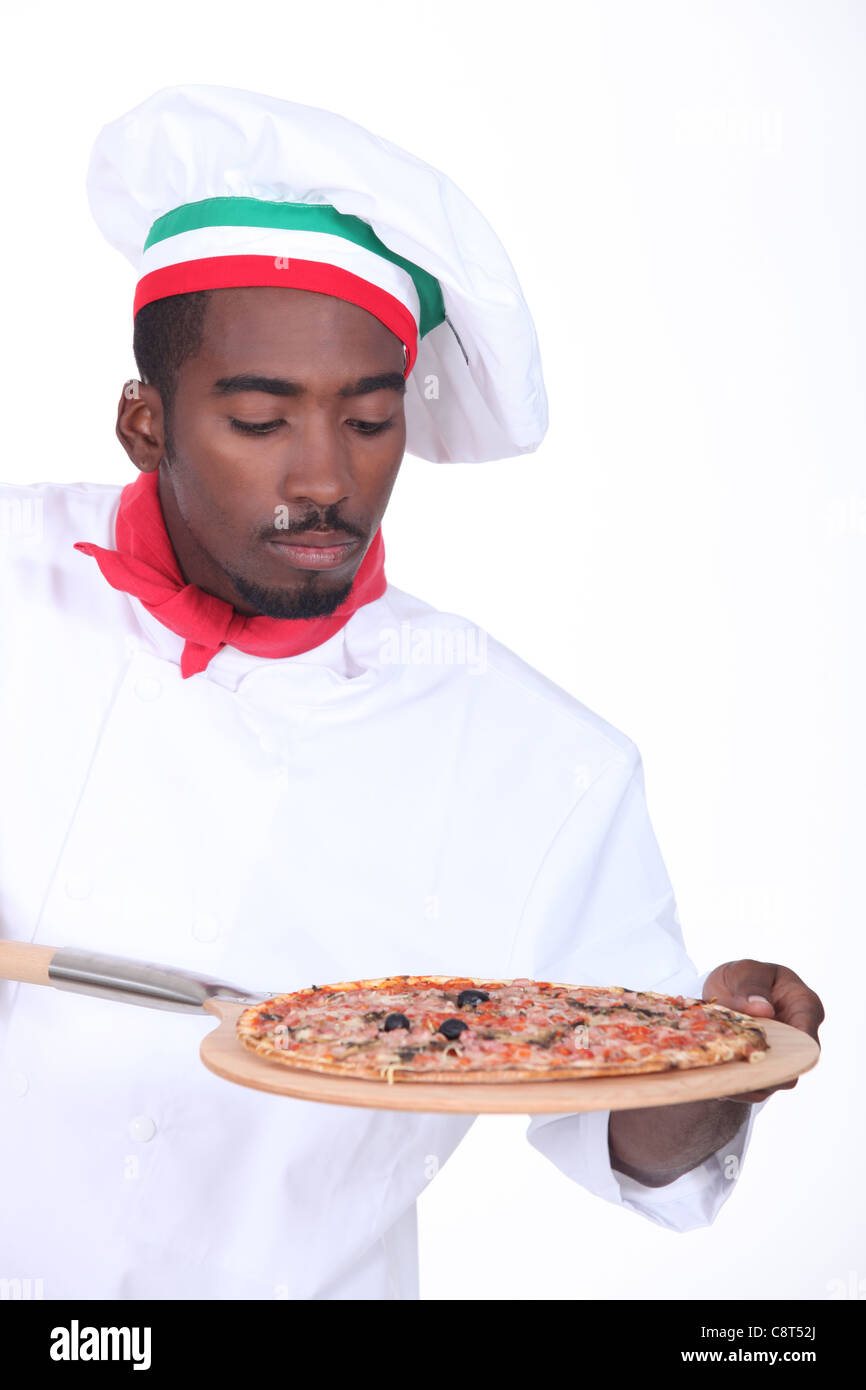 Pizza chef with an oven board Stock Photo Alamy