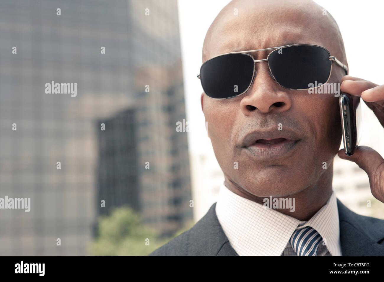 Black Businessman Talking On Cell Phone Outdoors Stock Photo Alamy