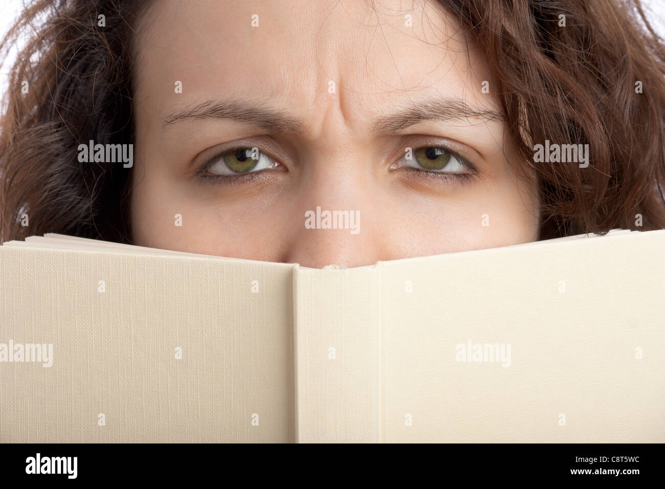 Scowl Woman with Book Stock Photo