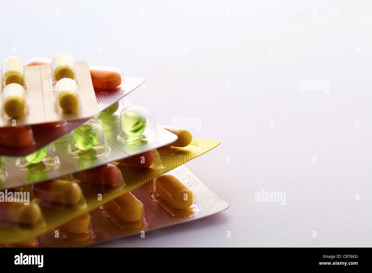 Close-up of stack of pills in packets Stock Photo