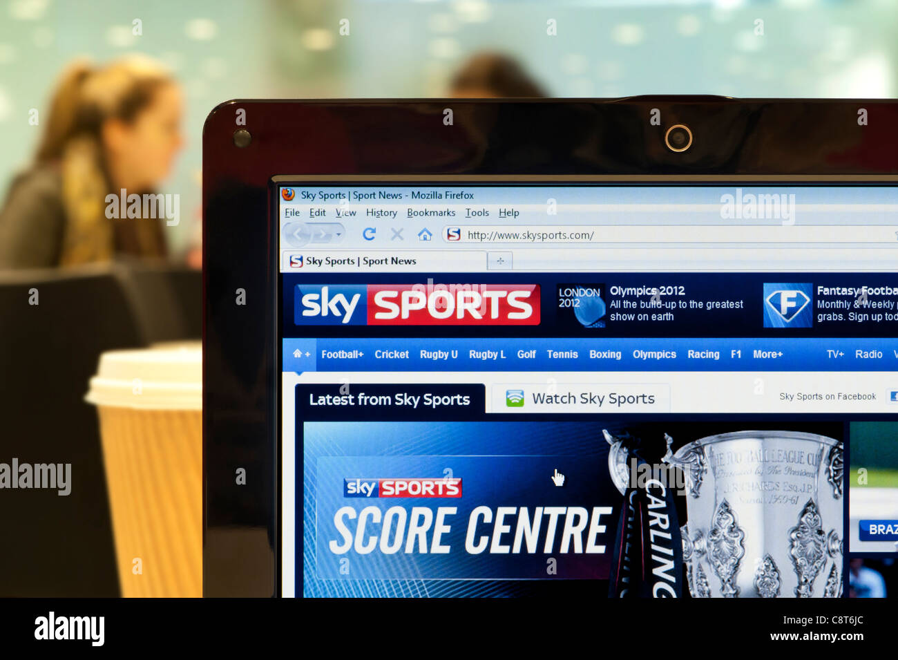 The Sky Sports website shot in a coffee shop environment (Editorial use only: print, TV, e-book and editorial website). Stock Photo