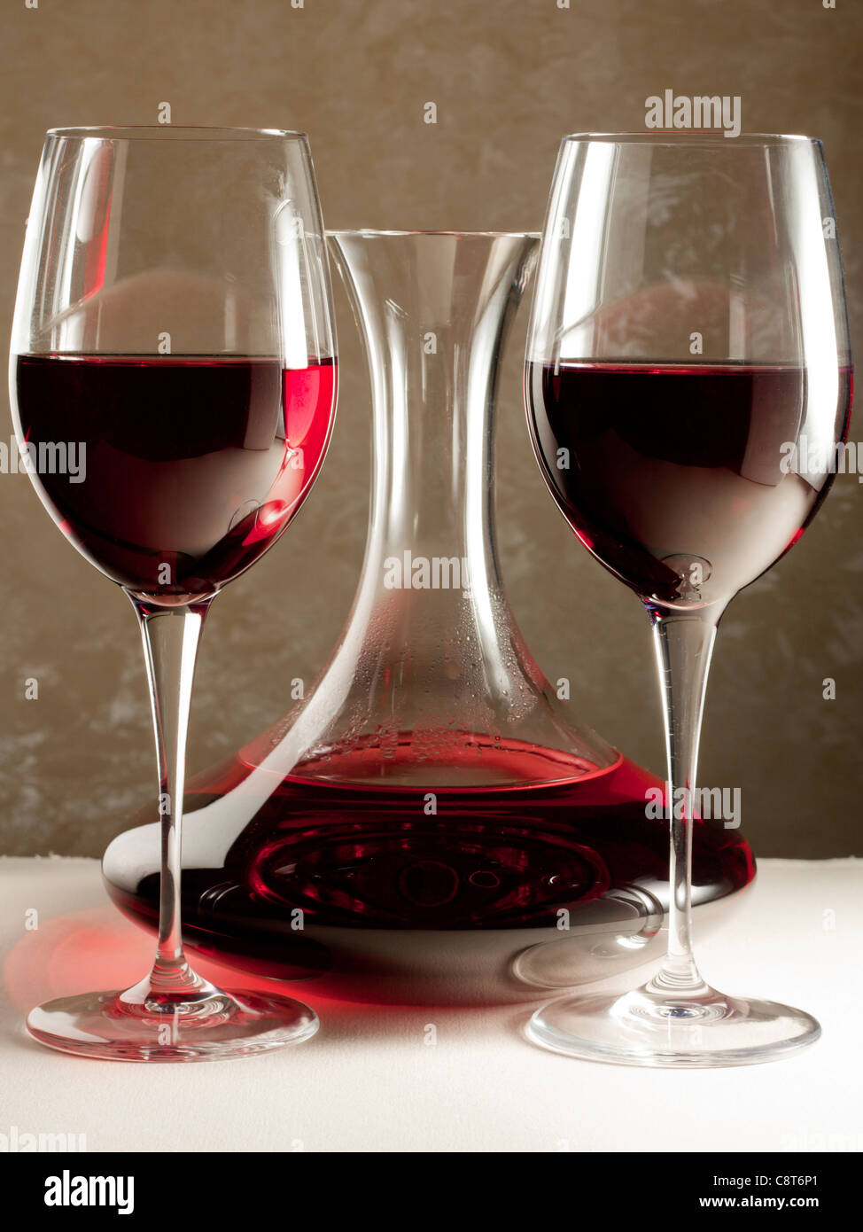 Decanter with Two Red Wine Glasses Stock Photo Alamy