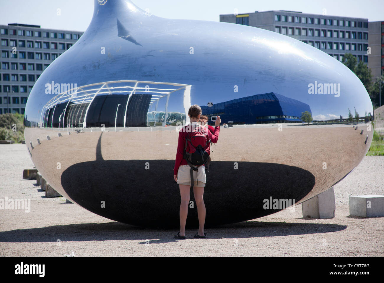 Sculpture in stainless steel, mirroring the Danish television building. Copenhagen Stock Photo