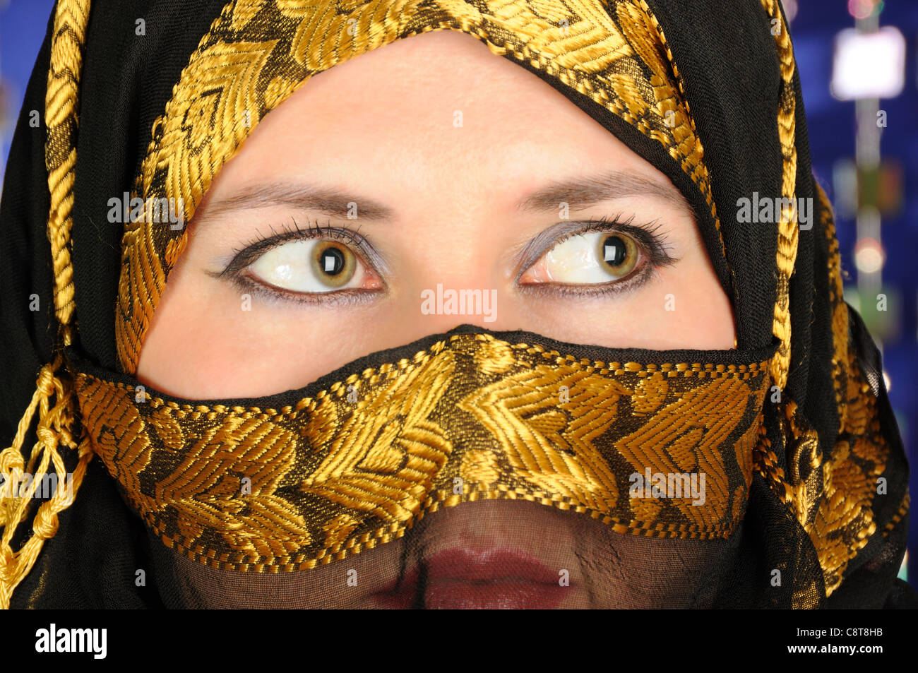 Close up picture of a Muslim woman cower face with a veil Stock Photo