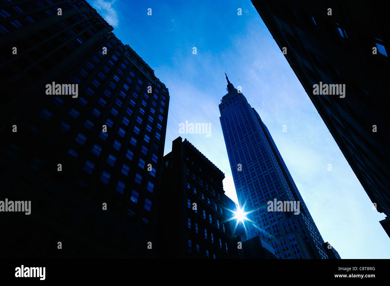 USA, New York City, Empire State Building with solar flare Stock Photo