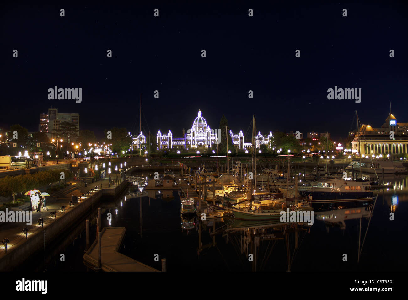 Parliament Buildings from the Inner Harbour in Victoria BC Canada at Night Stock Photo