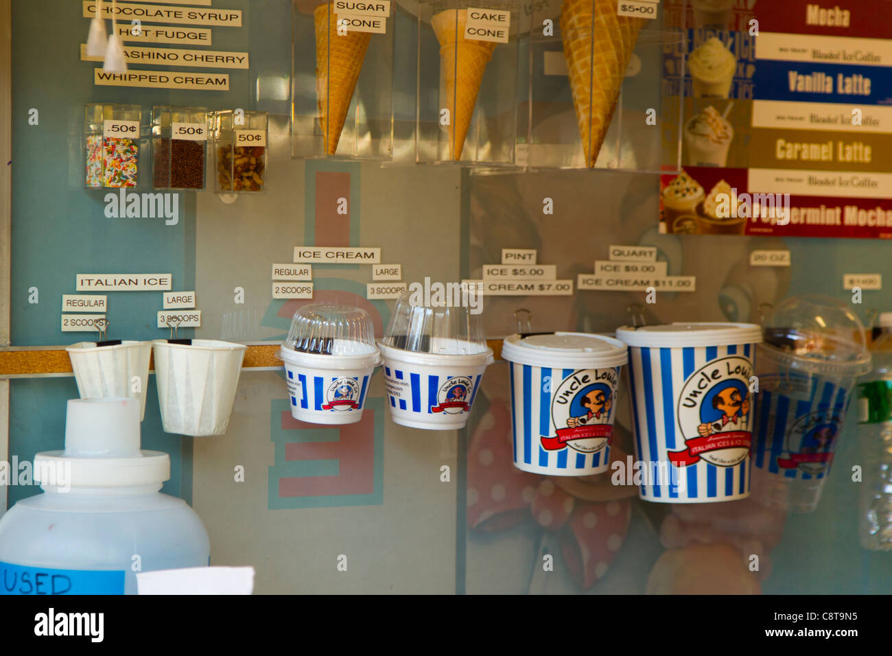Display at ice cream shop offering different size cups and cones Stock Photo