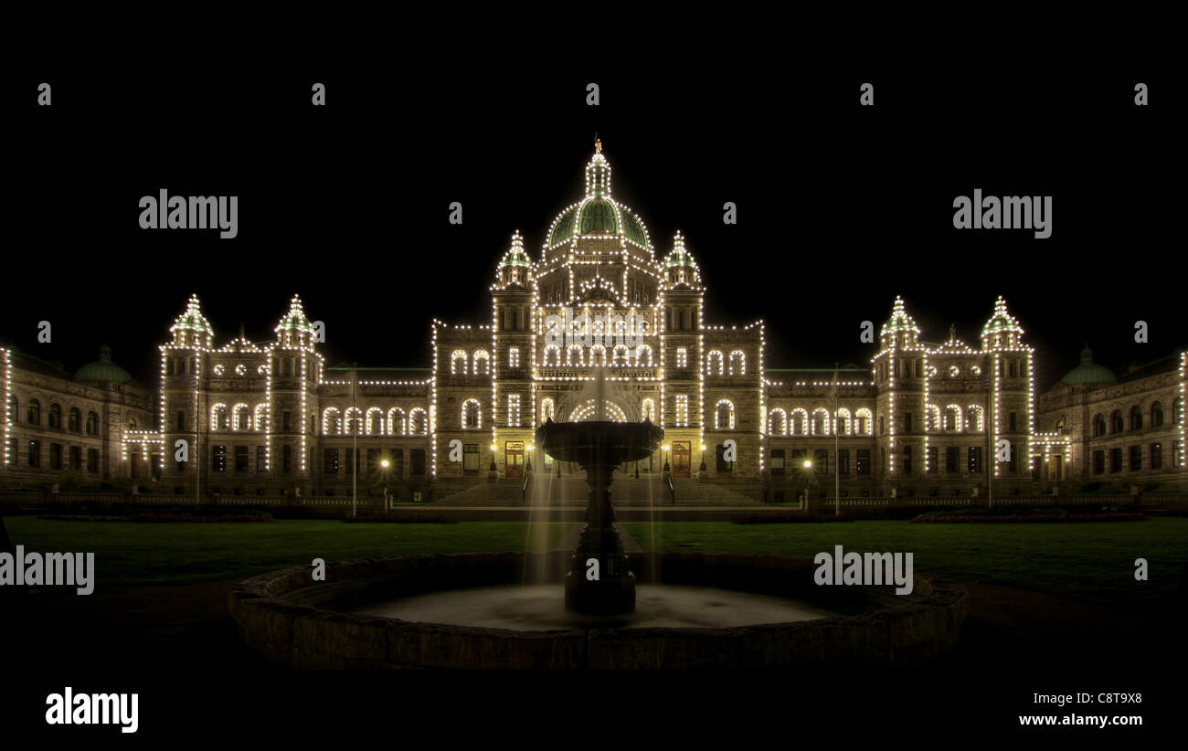Water Fountain by Parliament Buildings in Victoria BC Canada at Night Stock Photo