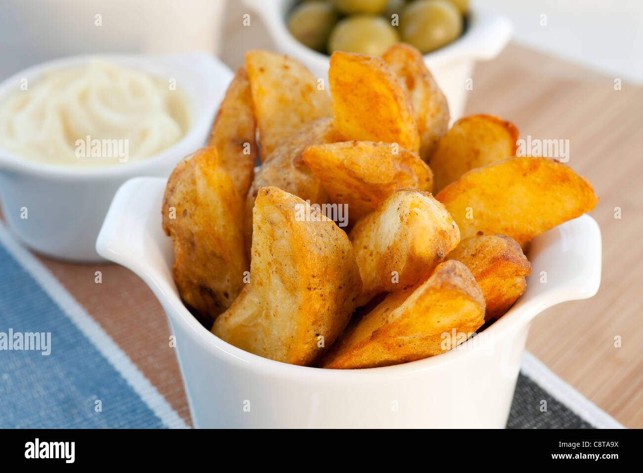 Spanish tapas, patatas bravas with garlic mayonnaise dipping sauce Stock Photo Alamy