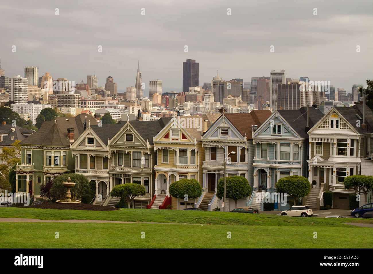 Painted Ladies Row Houses by Alamo Square with San Francisco Skyline Stock Photo
