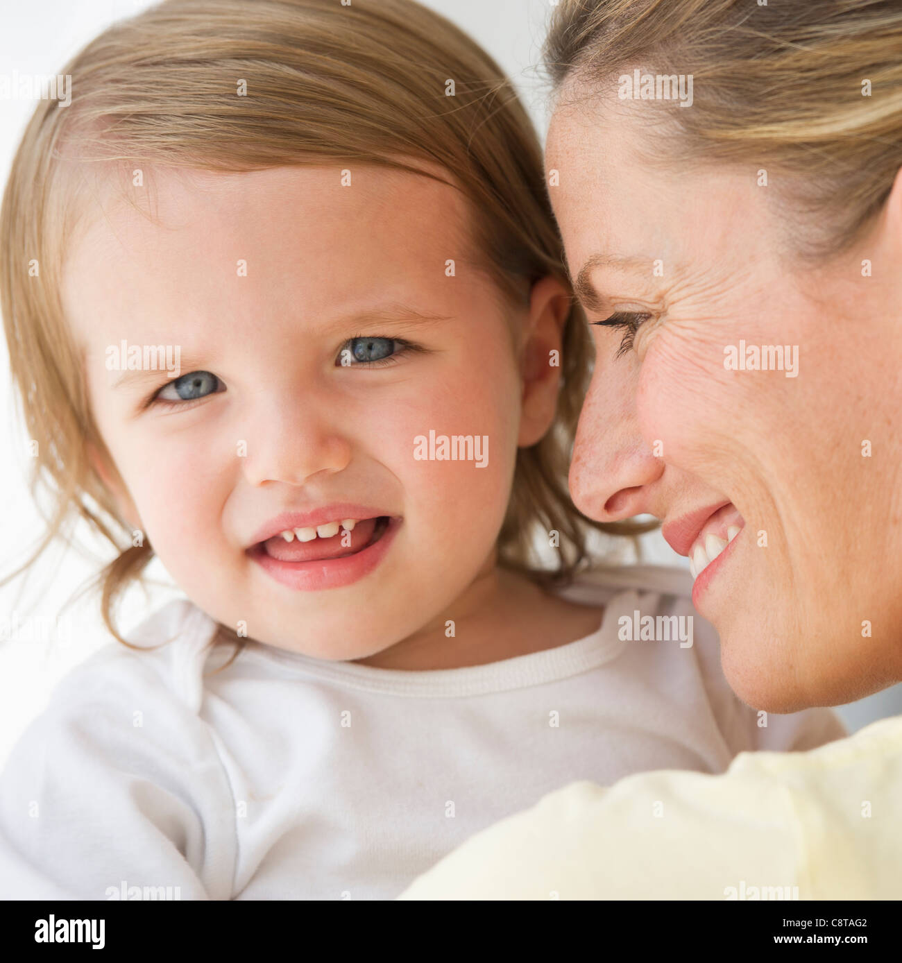 Holding 2 children mother usa hires stock photography and images Alamy