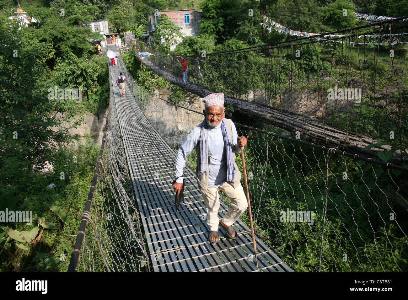 suspension bridge in nepal Stock Photo Alamy
