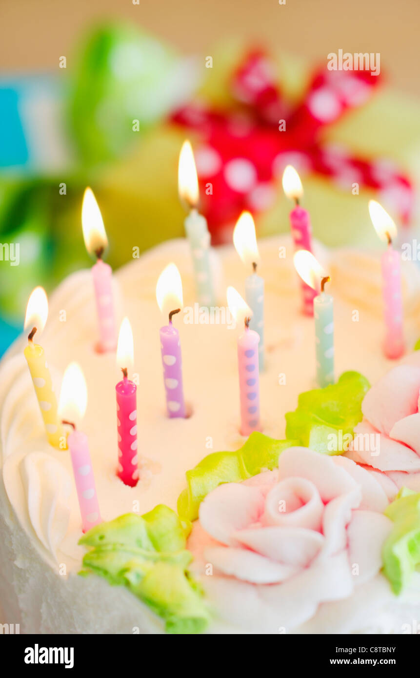 Birthday cake with celebration candles hi-res stock photography and ...