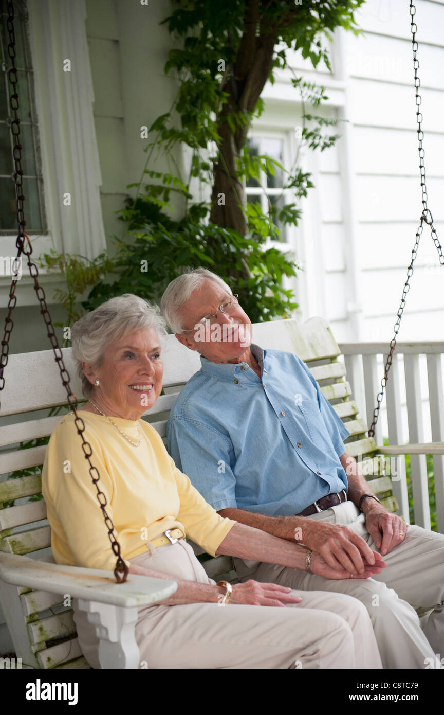 Old couple on swing hi-res stock photography and images - Alamy