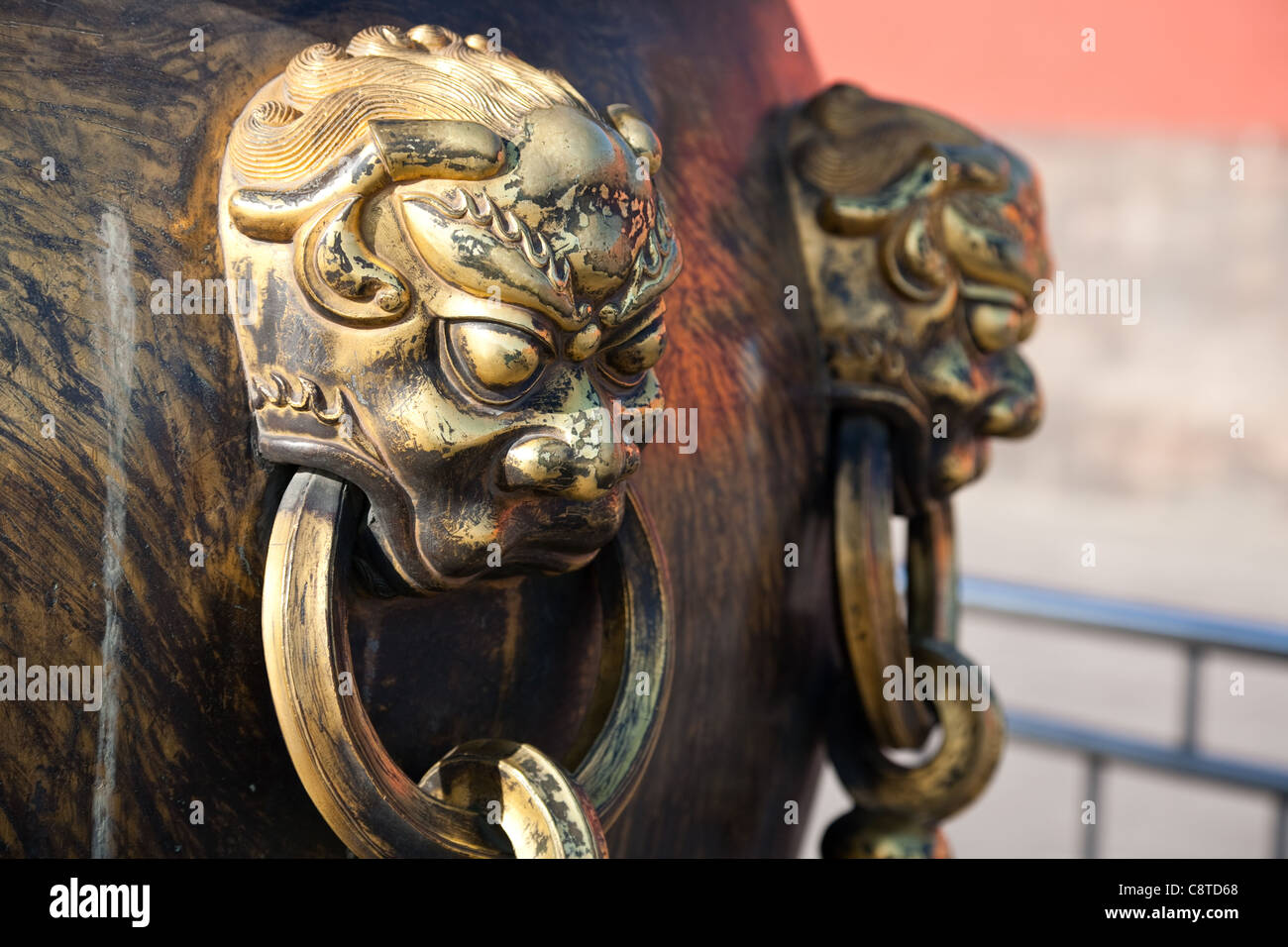 Lion head on a brass urn, means protecting the Forbidden City, Beijing, China Stock Photo