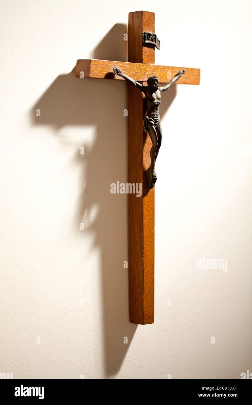 Simple Wooden Crucifix On Wall Stock Photo Alamy