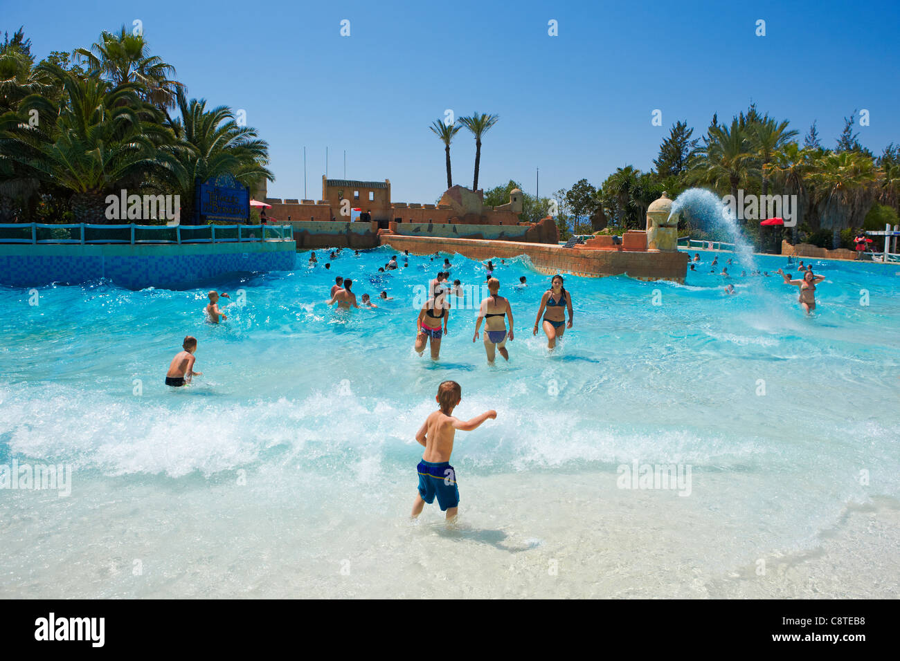 People bathing in the wave pool in Port Aventura Aquatic Park. Salou