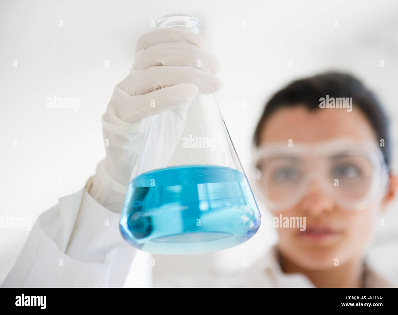 USA, New Jersey, Jersey City, Female lab technician holding viale Stock Photo