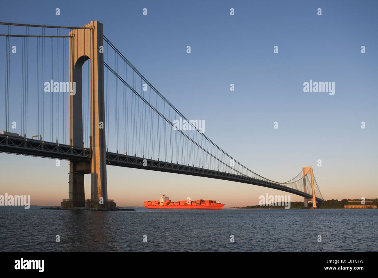 USA, New York State, New York City, Brooklyn, Container Ship under Verrazano-Narrows Bridge Stock Photo