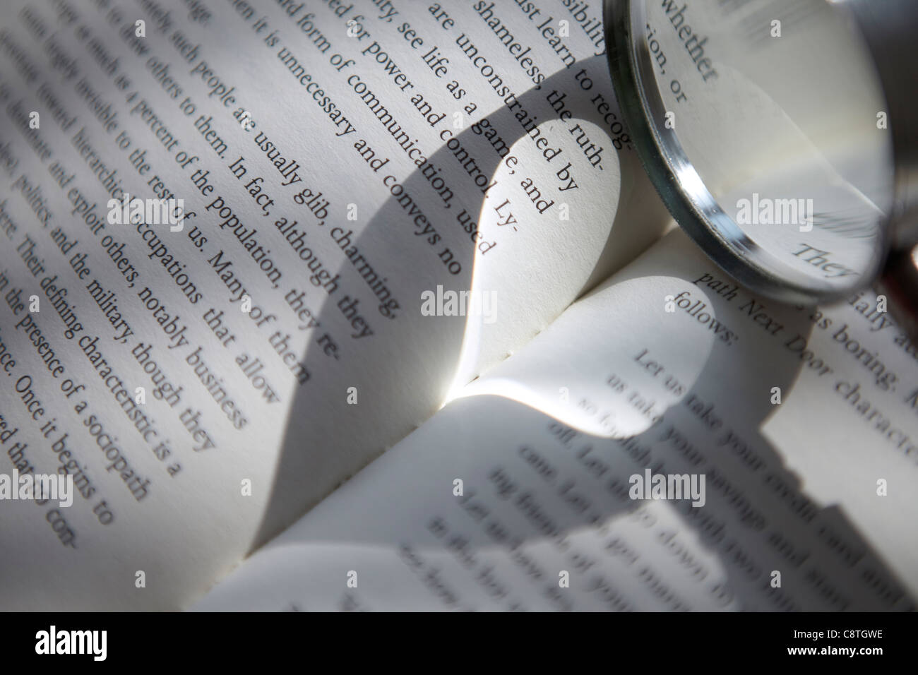 Book With Magnifying Glass Stock Photo Alamy