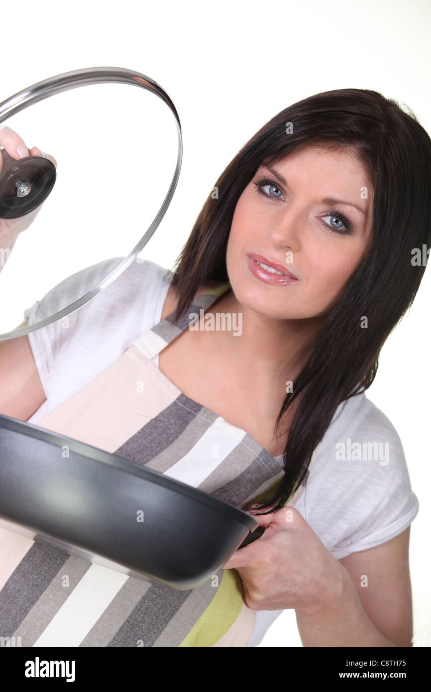 Woman cooking Stock Photo