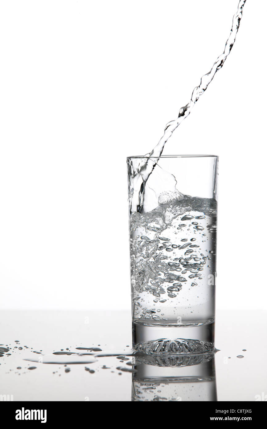 Water Pouring In A Glass Stock Photo Alamy