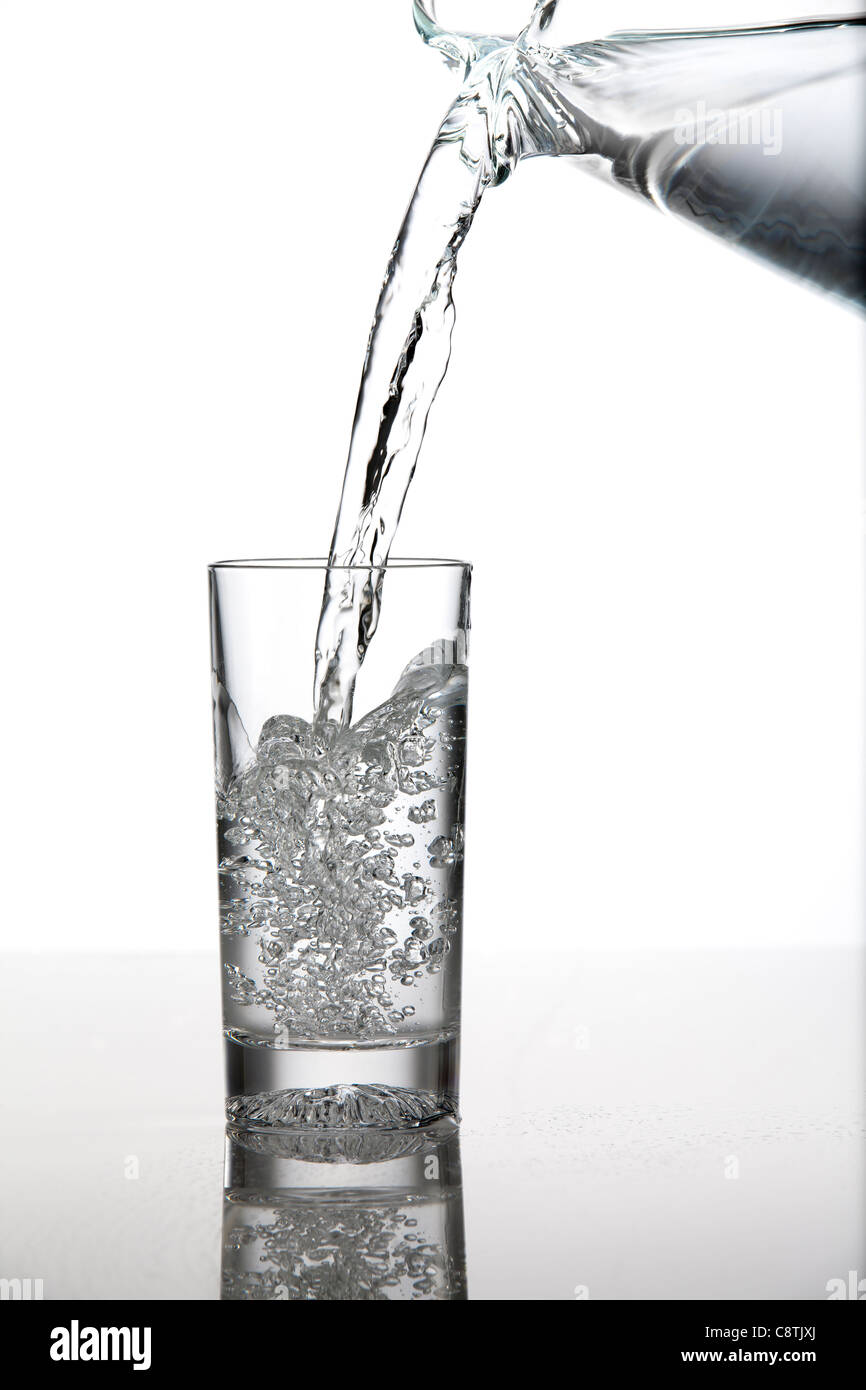 Water Pouring In A Glass Stock Photo Alamy