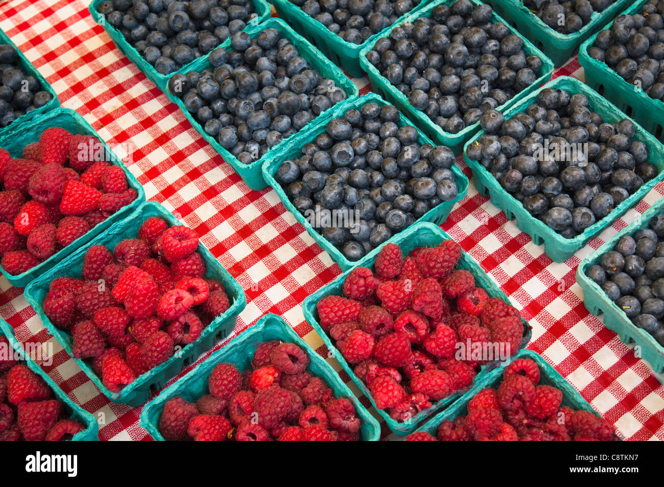 USA, Oregon, Lake Oswego, Raspberries and blueberries in cartons Stock ...