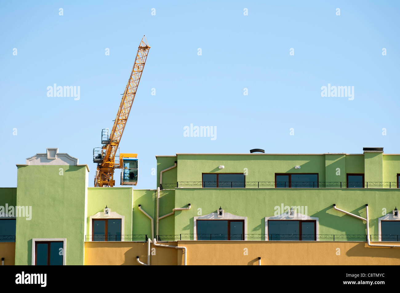 New colored building and crane Stock Photo
